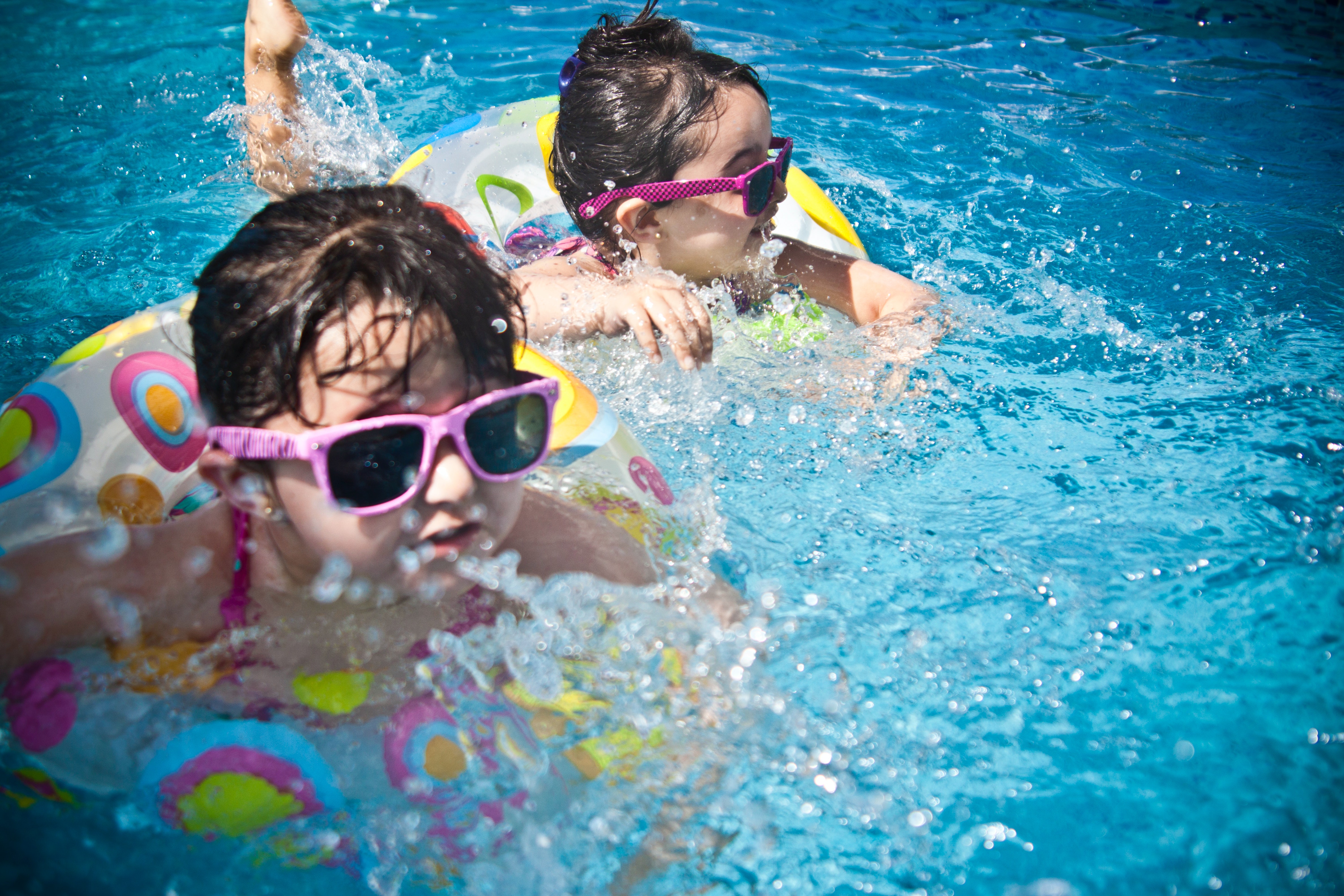 two kids in swimming pool